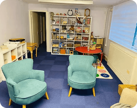 Family members sitting together during a family counselling session, working on communication and relationships